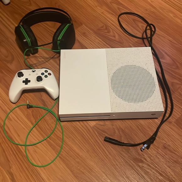xbox one s console with controller power cord and razer gaming headset